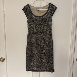 Sue Wong elegant dress, size 4, beautiful black beading with a cream undertone.